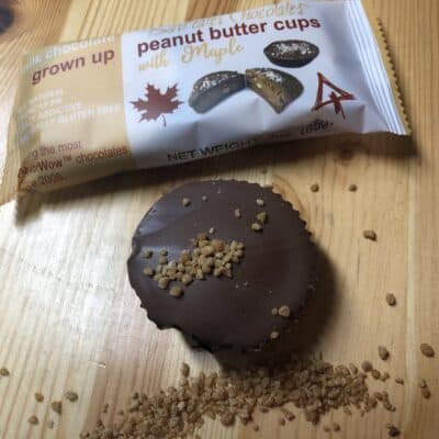 sleeve of maple peanut butter cups with one loose chocolate