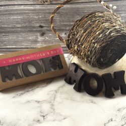 dark chocolate mom letters boxed and loose on marble