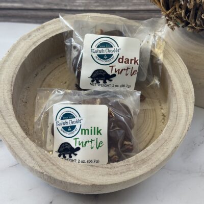 Packaged Dark and Packaged Milk Chocolate Turtles in bowl