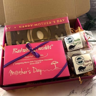 Open gift box with chocolates for mothers day