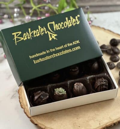 dark chocolate truffles in an open box